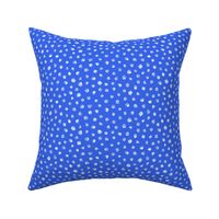 white chalk polkadots on cobalt blue