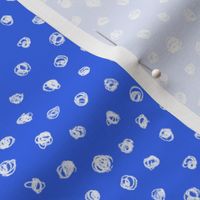 white chalk polkadots on cobalt blue