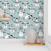 Cute winter snowman sweet snow woodland design with snow puppet in black and white and ice blue