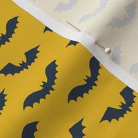 Halloween bats on yellow