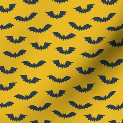 Halloween bats on yellow