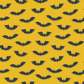 Halloween bats on yellow