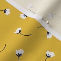 Tumbling flowers in mustard yellow