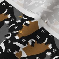 Tiny Trotting Border Collies and paw prints - black