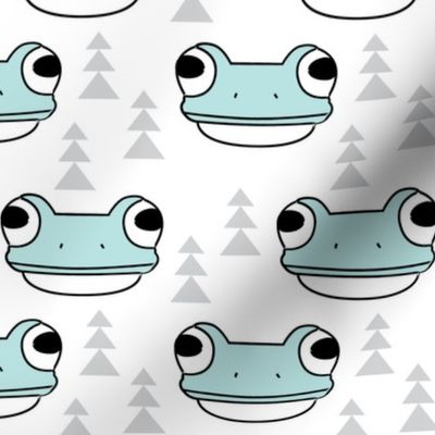 blue frog face and trees on white