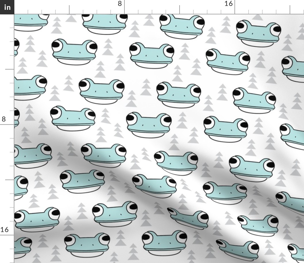 blue frog face and trees on white