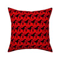 Two Inch Black and Dark Red Overlapping Horses on Red