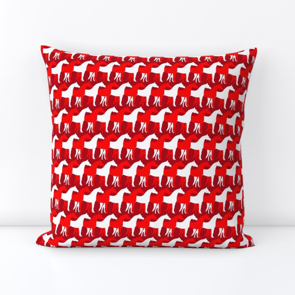 Two Inch White and Red Overlapping Horses on Dark Red