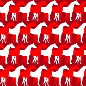 Two Inch White and Red Overlapping Horses on Dark Red