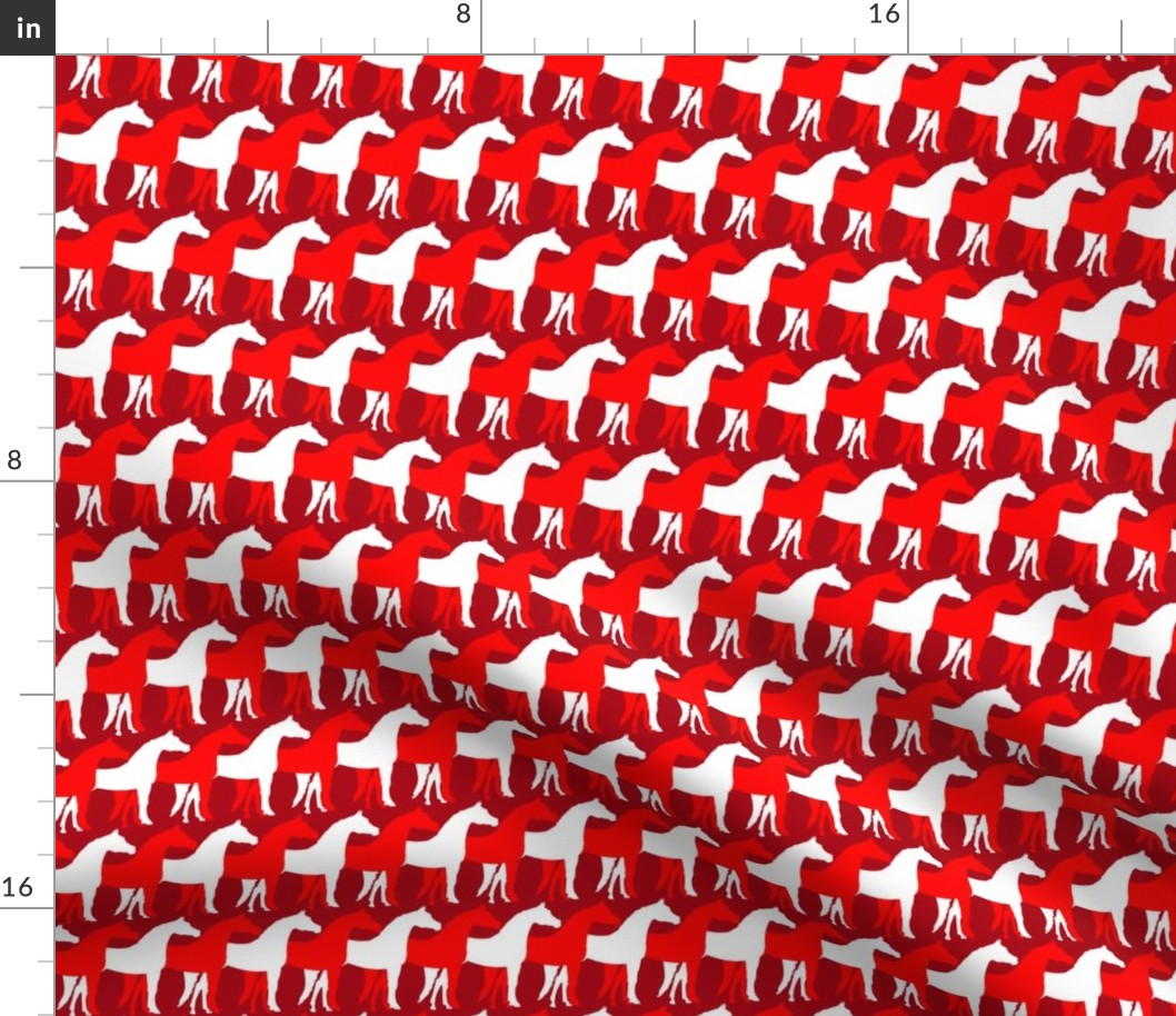 Two Inch White and Red Overlapping Horses on Dark Red