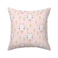 giraffe-and-leaves-on-soft-pink
