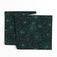 Spiderwebs - turquoise on black