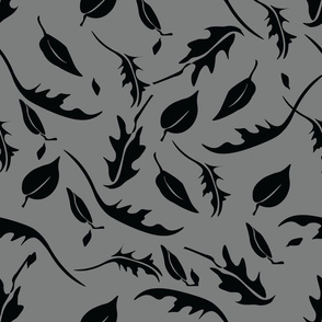 Black falling leaves on grey