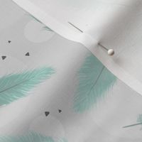 mint feathers on grey