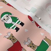 santa and reindeer // christmas xmas holiday fabric red and green santas cute reindeer sweaters fabric