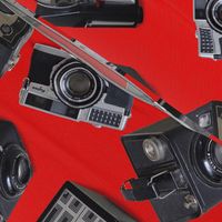 Vintage Cameras on red linen