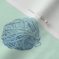 little yarn balls - light blue on mint