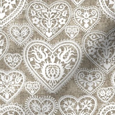 folk lace hearts on linen