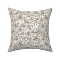 folk lace hearts on linen