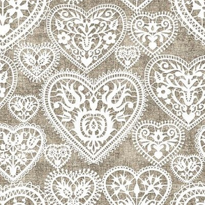 folk lace hearts on linen