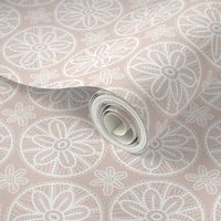 Lace pattern with white flowers on beige background