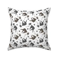Trotting Boston Terriers and paw prints - white
