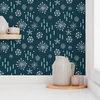 Pine trees and snow flakes winter wonderland and christmas holidays theme blue mint
