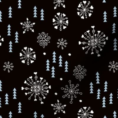 Pine trees and snow flakes winter wonderland and christmas holidays theme black ice blue