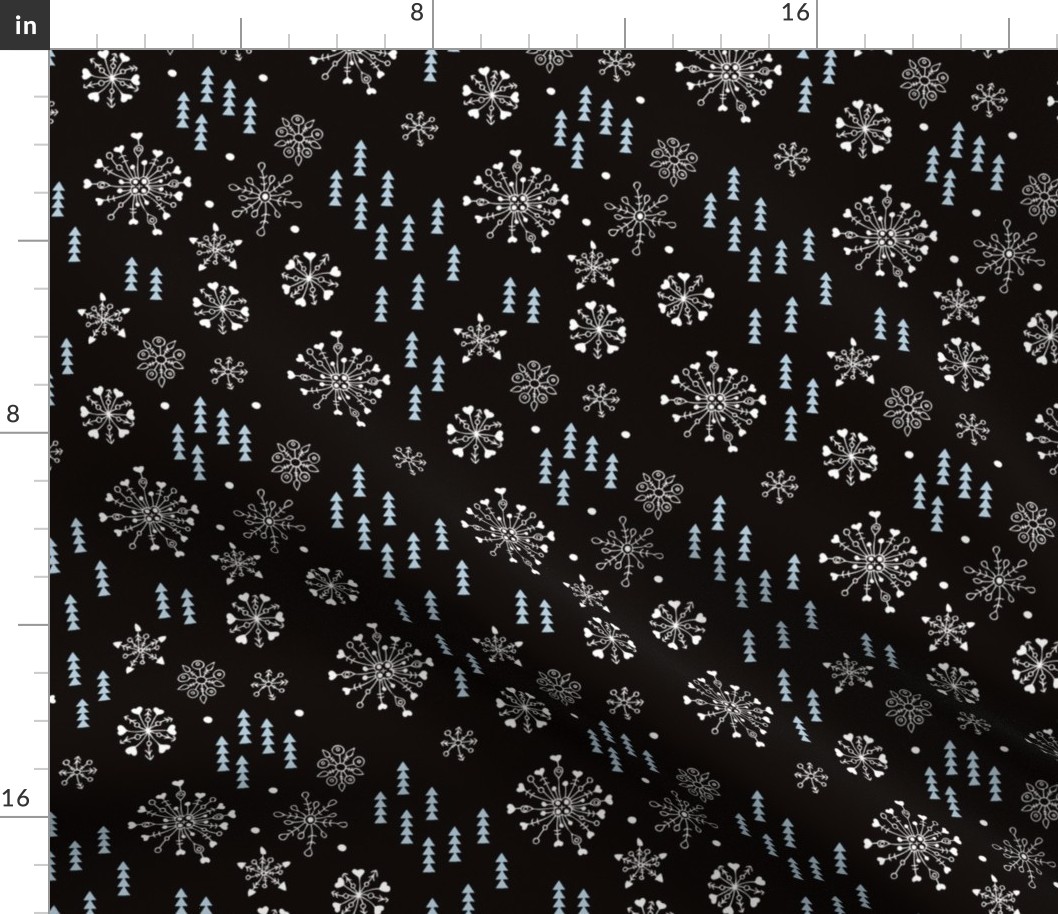 Pine trees and snow flakes winter wonderland and christmas holidays theme black ice blue