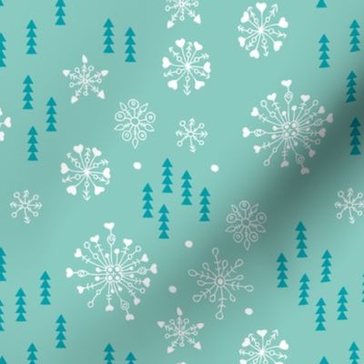 Pine trees and snow flakes winter wonderland and christmas holidays theme mint