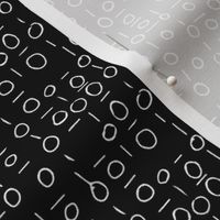 written binary code - circles and lines in black