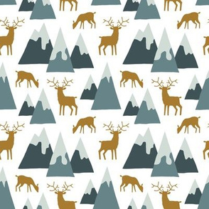 Alpine winter mountains with deer