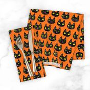 Cheeky Halloween cats with dots