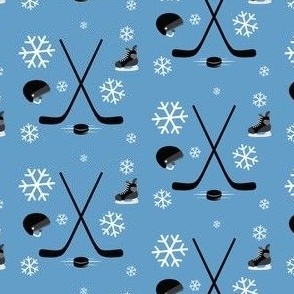 Hockey Equipment and Snowflakes on Light Blue