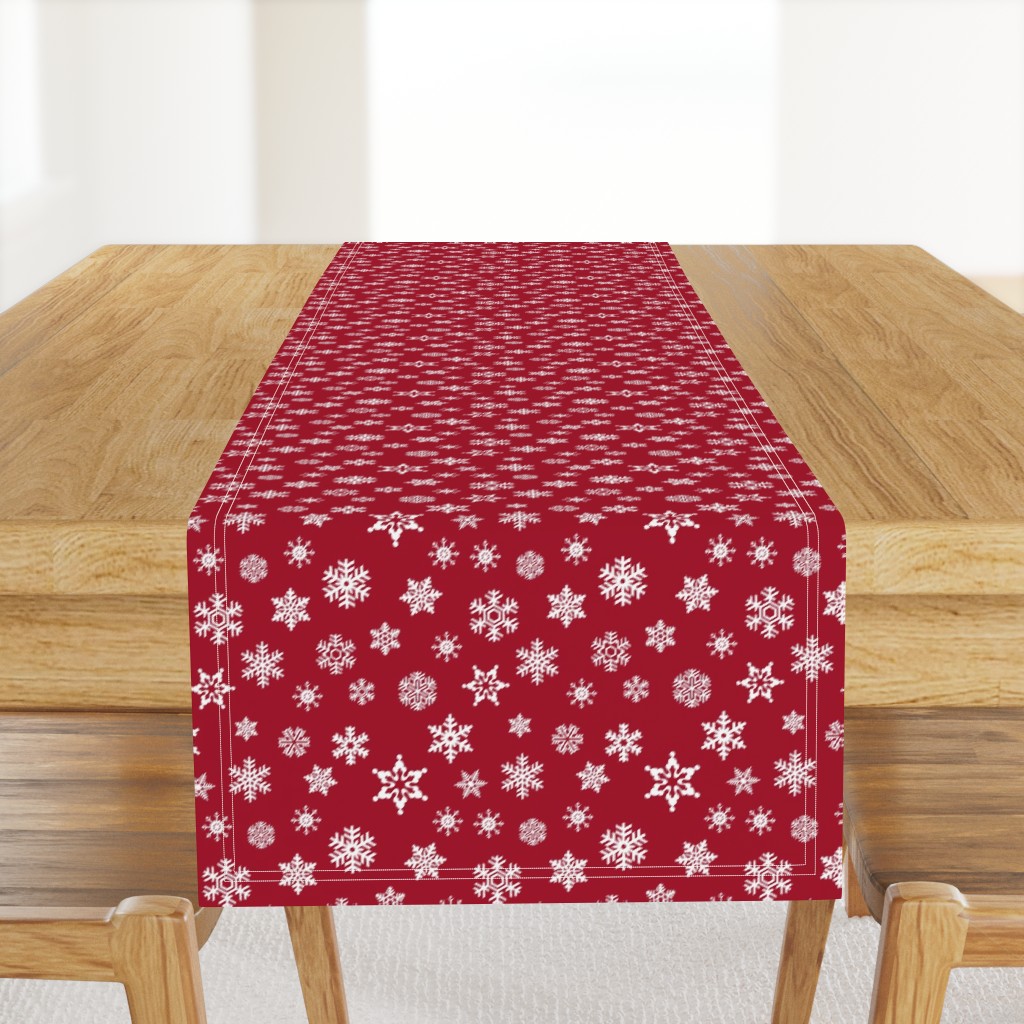 snowflakes on dark red holiday fabric