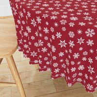 snowflakes on dark red holiday fabric