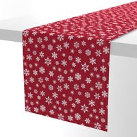 snowflakes on dark red holiday fabric