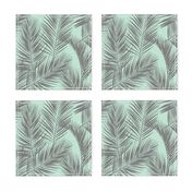 palm leaves - gray on mint, small. silhuettes tropical forest gray grey mint light green hot summer palm plant tree leaves fabric wallpaper giftwrap