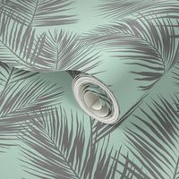 palm leaves - gray on mint, small. silhuettes tropical forest gray grey mint light green hot summer palm plant tree leaves fabric wallpaper giftwrap