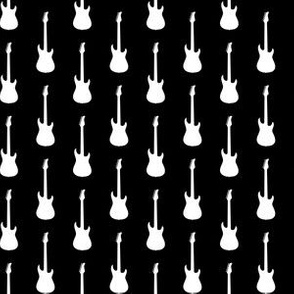 White Electric Guitars on Black