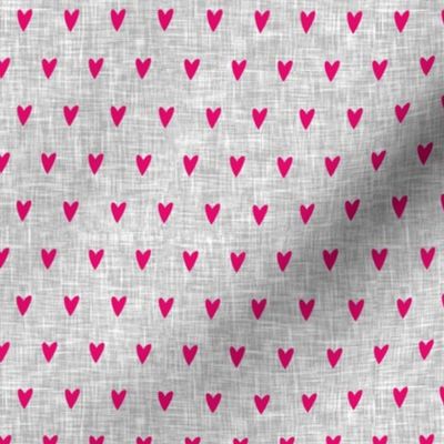 pink hearts on light grey linen