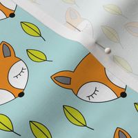 foxes-sleeping-and-leaves-on-soft-blue