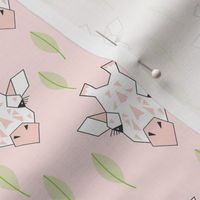 small giraffes and leavs on soft pink