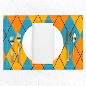 A modern take on classic argyle with orange and teal blue diamonds.