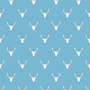 white deer on light blue