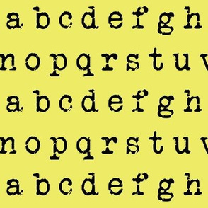 Typewriter Alphabet on Vintage Yellow