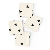 Black triangles (large) on ivory || scattered