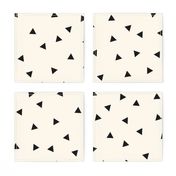 Black triangles (large) on ivory || scattered