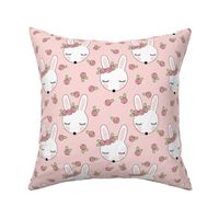 sleeping bunnies-with-pink-rosebuds on pink