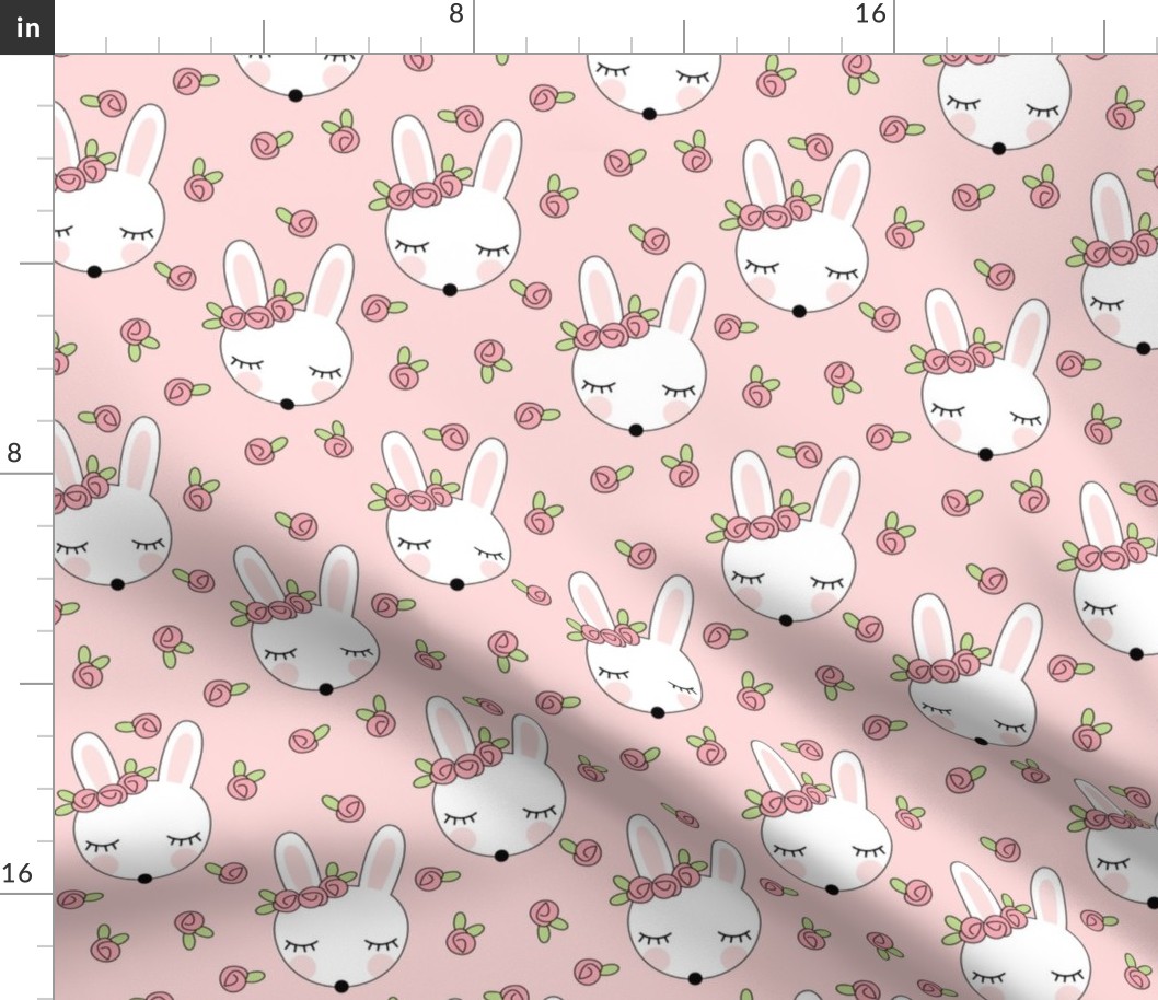 sleeping bunnies-with-pink-rosebuds on pink